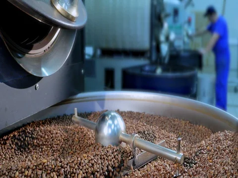Cooling coffee beans after roasting. Roasting machines in roastery. Stock-Footage 72730662