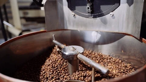 Cooling coffee beans after roasting. Roasting, closeup, slow motion Stock Footage 119884957