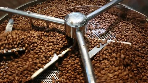 Cooling coffee beans after roasting. Roasting machine, close-up Mixing roasted 스톡 동영상 334643568
