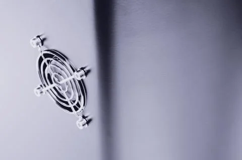 Cooling CPU cooler on a dark casing. Cooling fans are illuminated Stock Photos