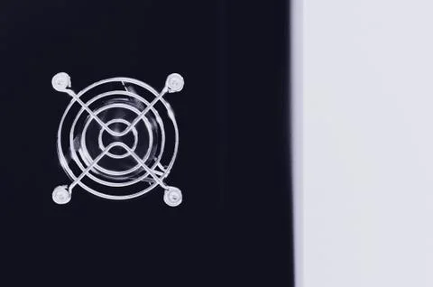 Cooling CPU cooler on a dark casing. Cooling fans are illuminated Stock Photos