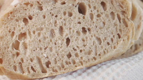 Cooling-down of tasty looking bread 4K video Stock Footage 156056040