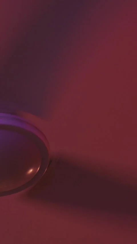 Cooling fan under the ceiling in pink lighting Stock Footage 328419290