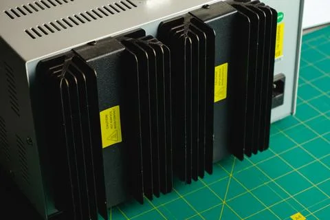 Cooling fins on a powerful engineering electronic device Stock Photos