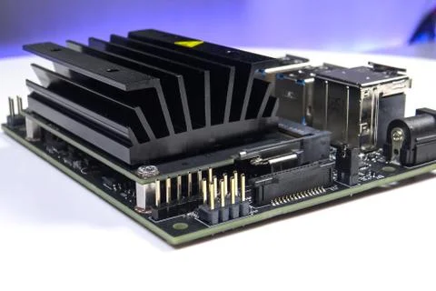 Cooling radiator for mini computer board. Cooling electronics. Stock Photos