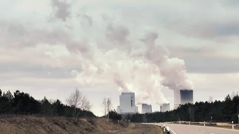 Cooling system of nuclear power plant, huge clouds and smoke in background Vídeo Stock 89602854