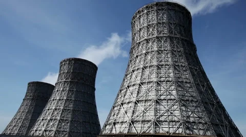 The cooling system of a nuclear reactor. Three cooling towers Video stock 64151692