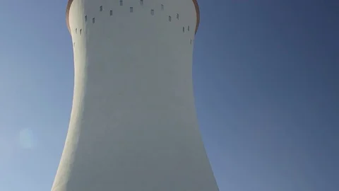 Cooling tower against the blue sky in Marghera industrial area - Venice - Tilt Stock Footage 85053025