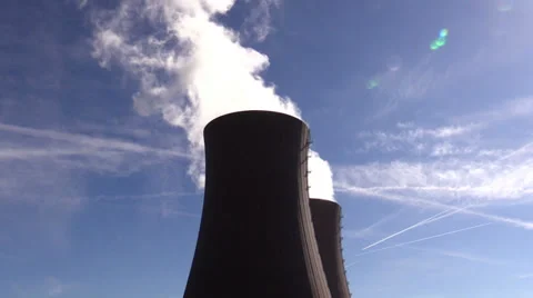 Cooling tower of nuclear power plant against sky and sun Stock Footage 36781753