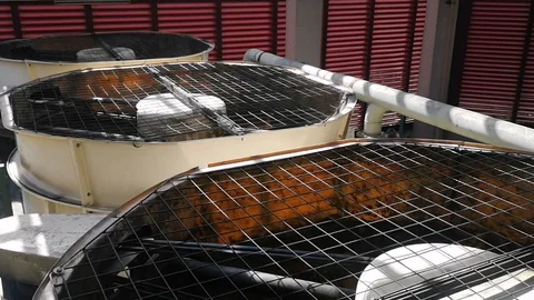The cooling tower is in operation. The fan operates to absorb the hot water temp Stock Footage 120545415