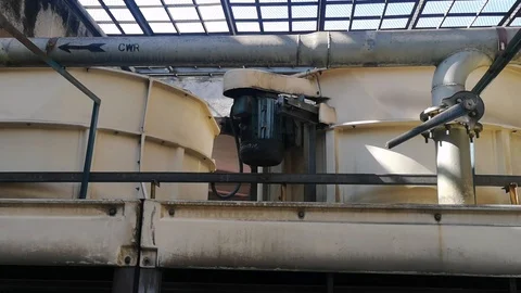 The cooling tower is in operation. The fan operates to absorb the hot water temp Stock Footage 120545465