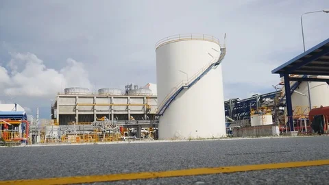 Cooling tower in refinery plant with engineer working in area Stock Footage 81527062