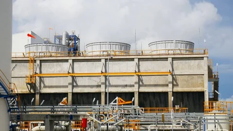 Cooling tower in refinery plant | Stock Video | Pond5