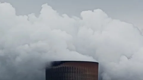 Cooling tower of RWE Neurath power plant releasing thick white steam Germany Stock Footage 344518551