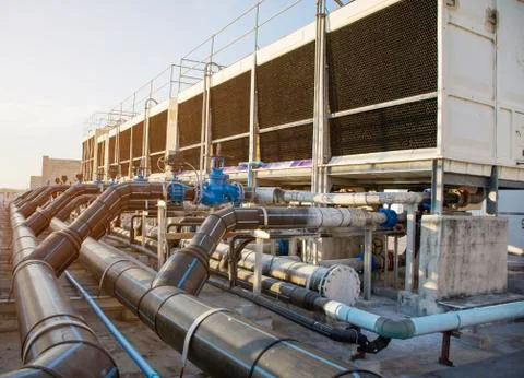 Cooling tower set in a large building Data center is installed on the roof -  Stock Photos