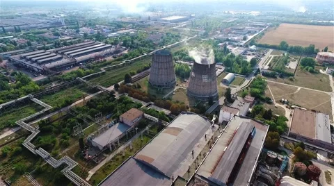 Cooling tower thermal power station HD aerial video. Flight over industrial area Stock Footage 68583403