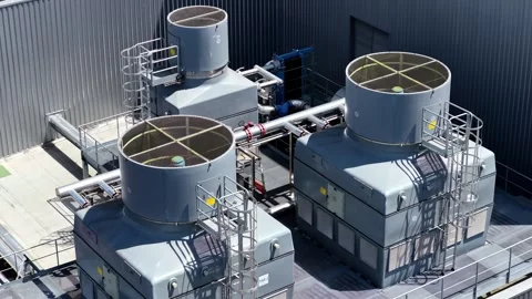 Cooling Tower Units on Industrial Rooftop, Drone Flyover Stock Footage 341543521