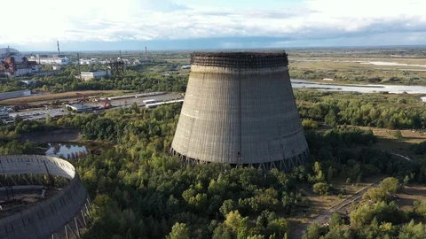 Cooling towers for cooling units 5 and 6 of the Chernobyl nuclear power plant. 库存影片 128320438