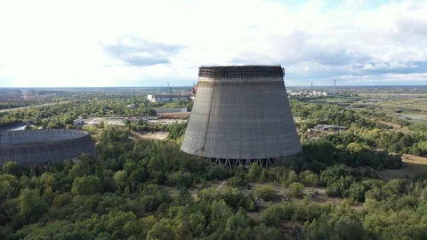 Cooling towers for cooling units 5 and 6 of the Chernobyl nuclear power plant. Stock Footage 128321475
