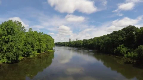 Cooling Towers on the river Stock Footage 70712934