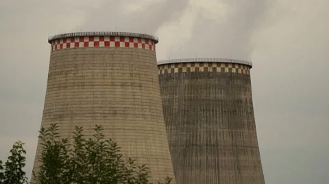 Cooling towers of thermal power plant emits steam Stock Footage 66442653