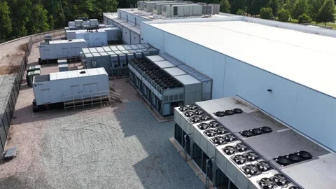 Cooling Units and Generators Beside a Data Center Wall Stock Footage 347701712