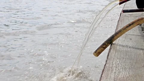 Cooling water from the ferry engine flows out of the hoses Video stock 266198528
