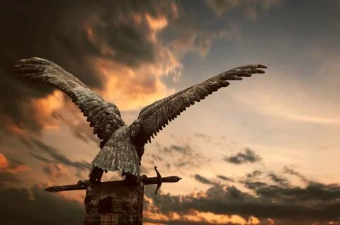 Cooper bird with a sword Stock Photos