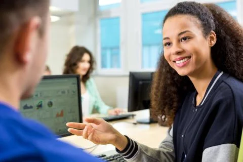 Cooperation in solving computing tasks Fotos Stock