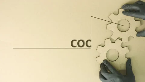 Cooperation text at cogwheels made from recycled cardboard Stock Footage 141473841