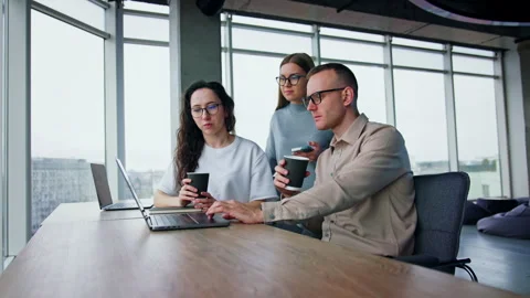 Cooperative colleagues trying to find the problem solution or ideas working toge Stock Footage 240544053