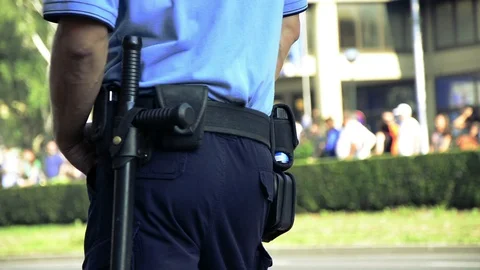 Cop from behind Stock Footage 99399252