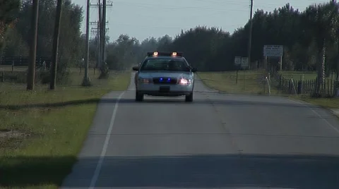 Cop Car Coming Straight On Stock Footage 48339743