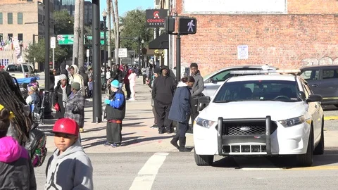 Cop car by intersection and crow - SLOW MOTION Stock Footage 128445783