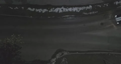 Cop ghost car chases a Ford Mustang - Top Angle - Night Stock Footage 146471216