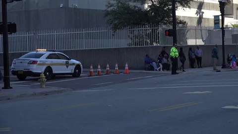 Cop guarding road Stock Footage 128445840