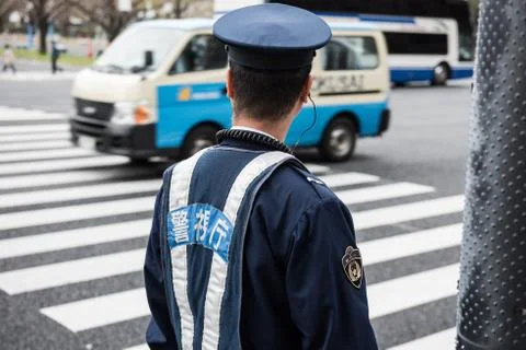 Cop watching traffic Stock Photos