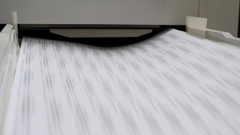 The copier prints copies of documents at high speed Stock Footage 129948957