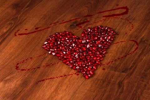 Copmposition heart pomegranate Stock-Fotos