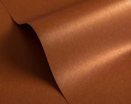 Copper and rust paper texture with a glossy metallic finish and subtle wavy Stock Photos