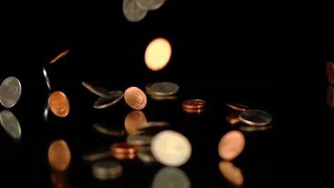 Copper and Silver Coins Falling and Bouncing in Slow Motion Видео 337485620