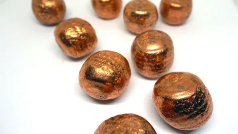 Copper balls against a white background. Stock Footage 331173329