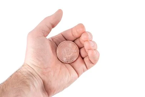 Copper bitcoin in hand Stock Photos