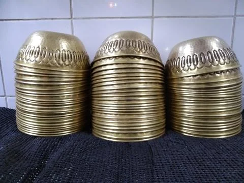 The copper bowls keep on the rack Stock Photos