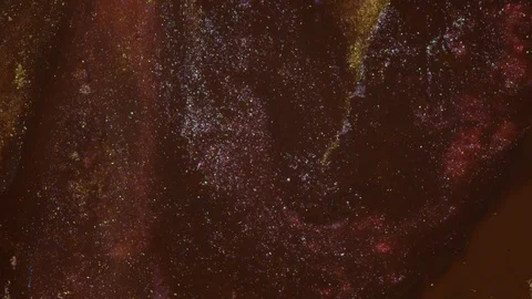 Copper, brown, bronze, gold glitter colors mix in motion Stock Footage 110723367