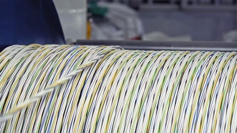 The copper cable is twisted into a skein. Copper cable manufacturing process Stock Footage 137640341