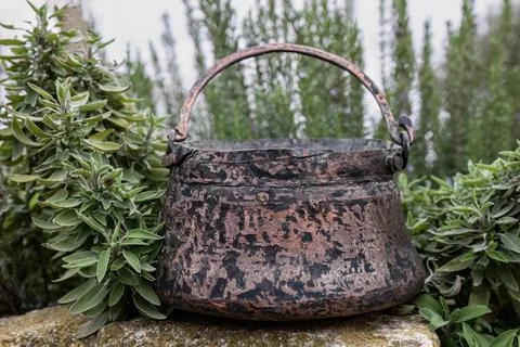 Copper cauldron with a handle Stock Photos