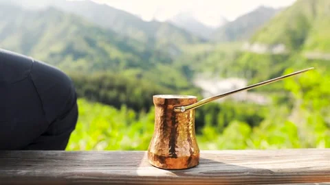 Copper Cezve for coffee in the mountains Stock Footage 244053394