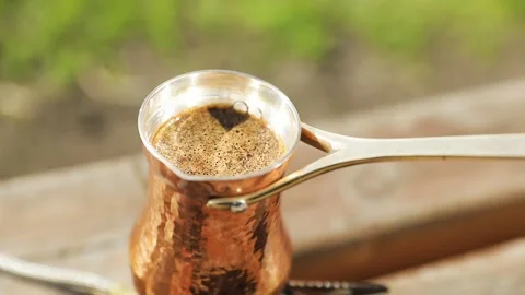 Copper Cezve for coffee in the mountains Stock Footage 244053564
