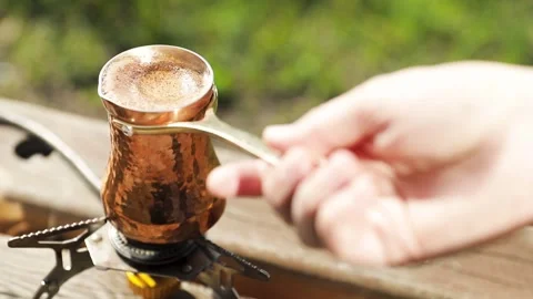 Copper Cezve for coffee in the mountains Stock-Footage 244061233